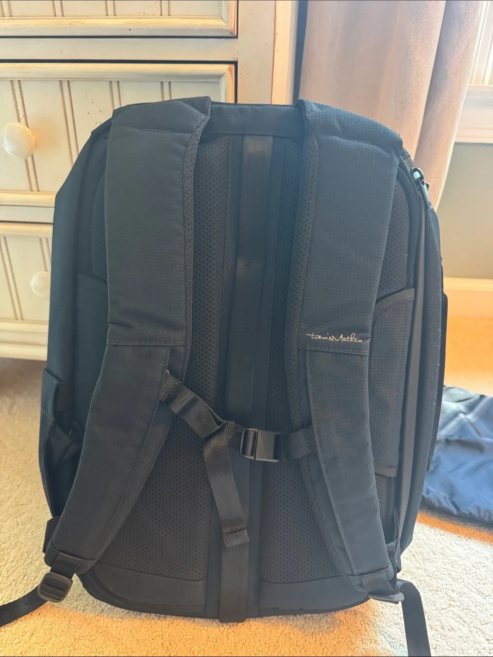 Travis Mathew sleek black